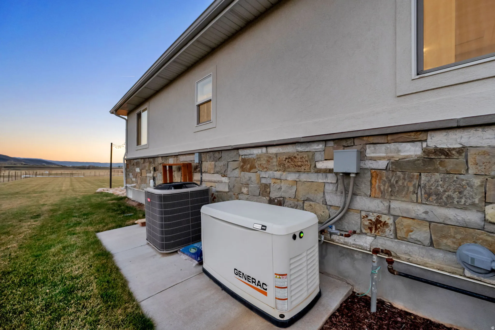Exterior view of stone siding and stucco siding