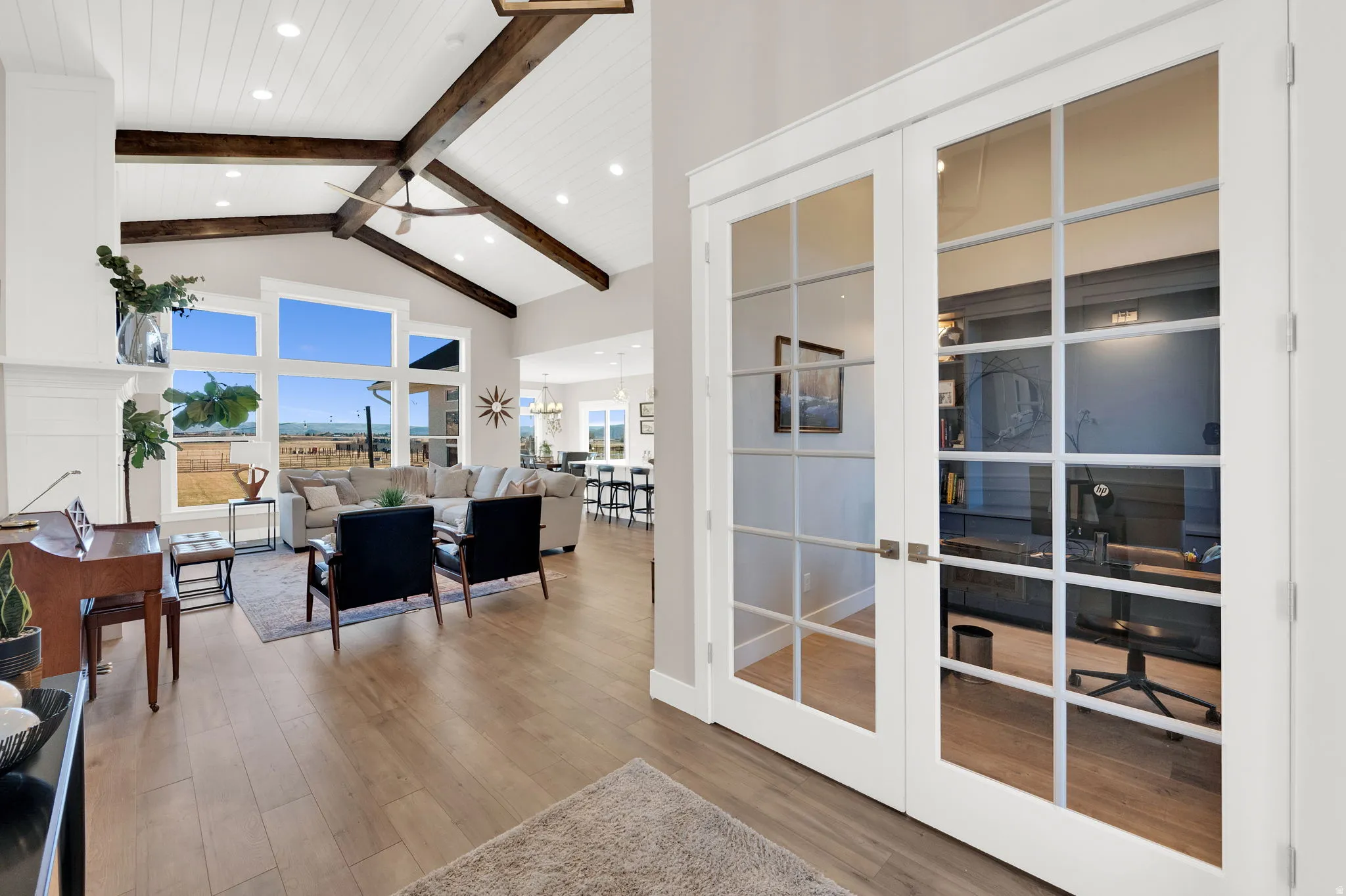 Doorway featuring wood finished floors, french doors, and recessed lighting