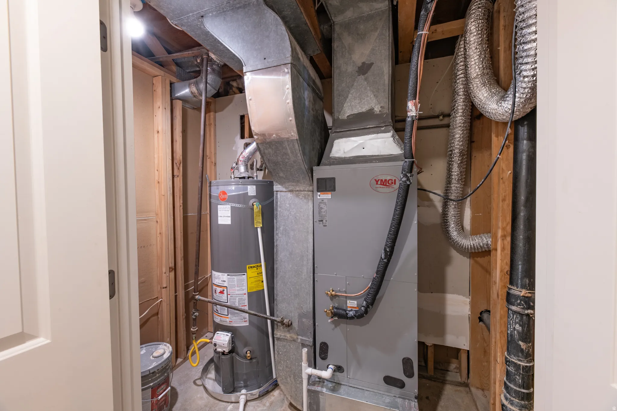 Utilities featuring gas water heater and heat pump.