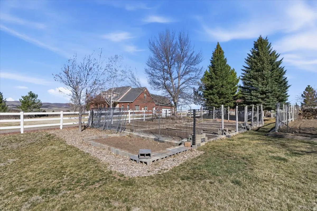 View of yard with a garden