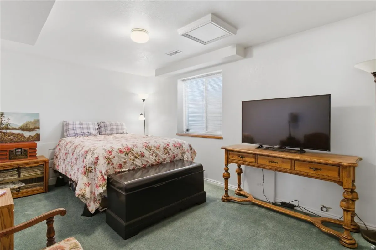 Bedroom featuring carpet