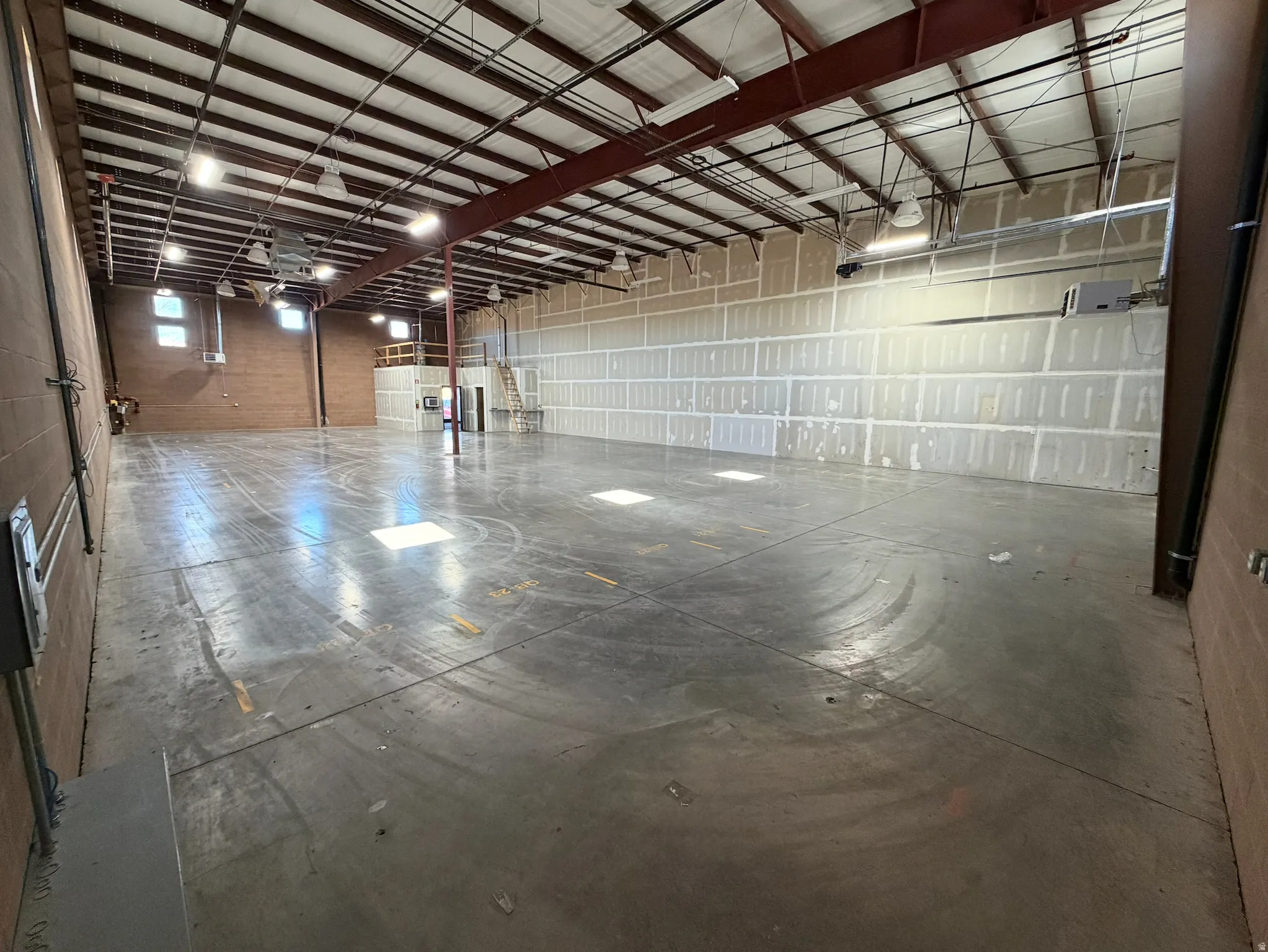 Garage featuring heating unit