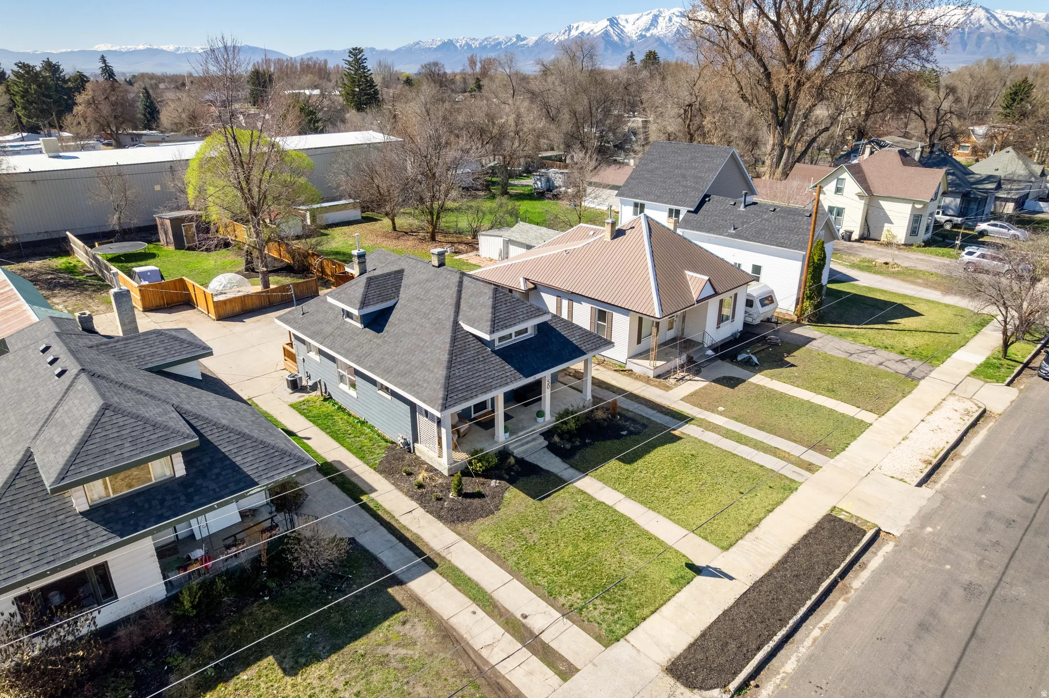 Aerial perspective of suburban area featuring mountains