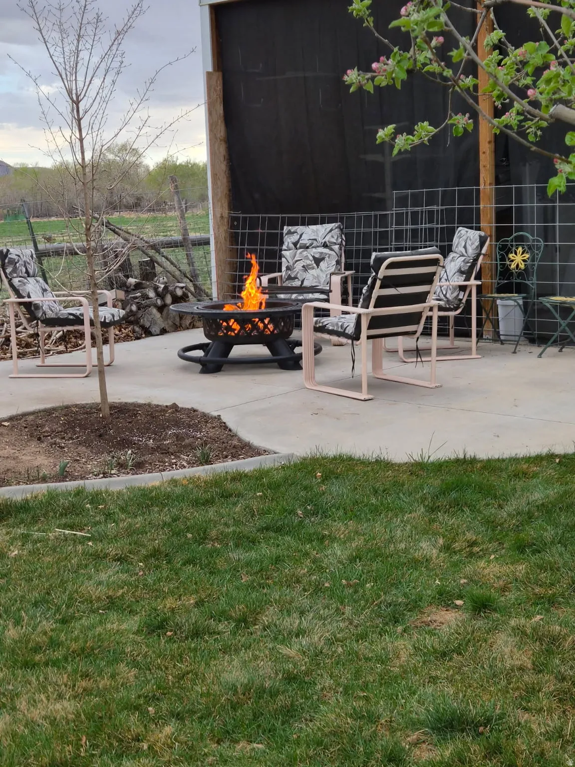 View of patio / terrace featuring a fire pit