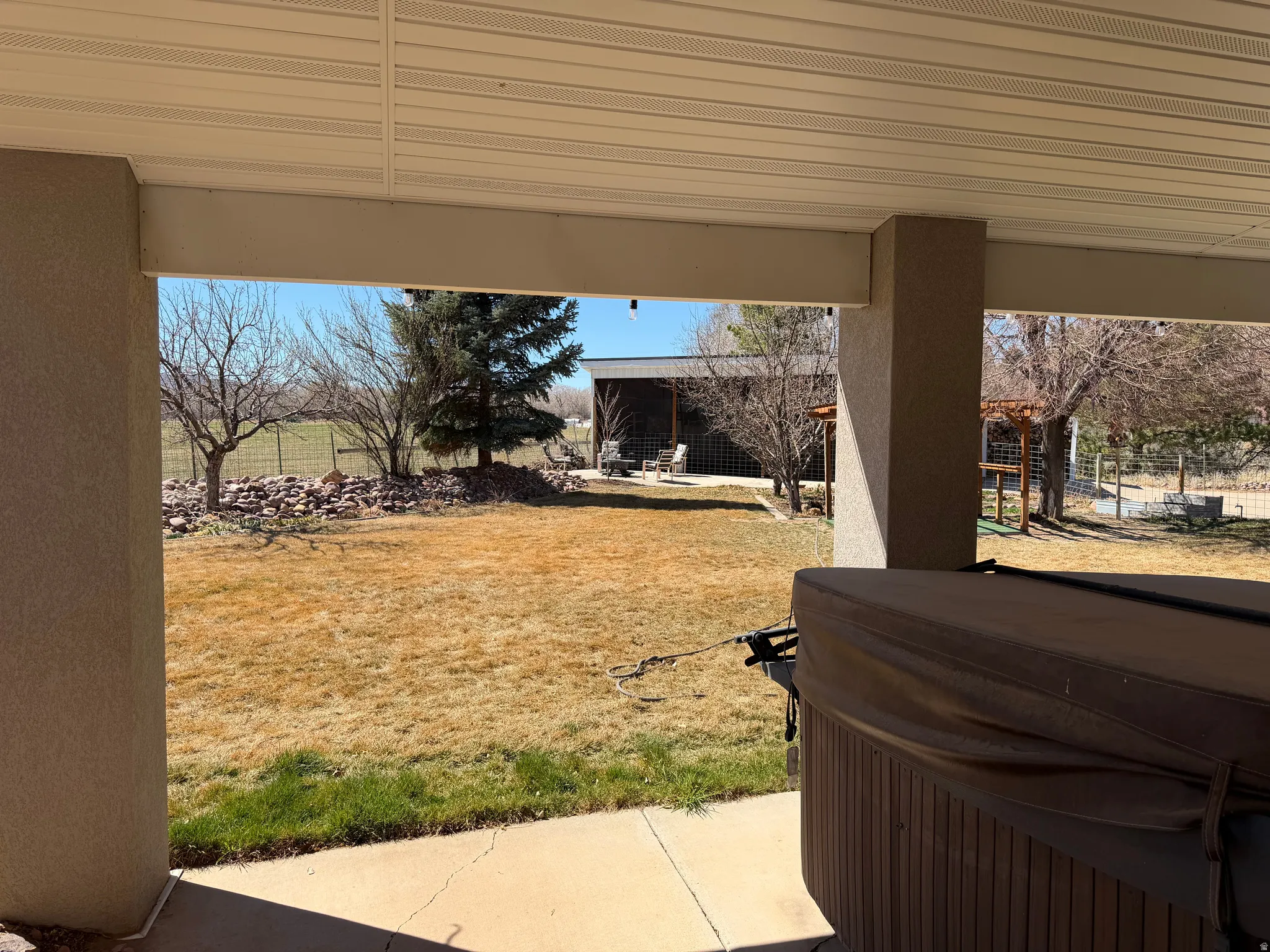 Fenced yard with a patio