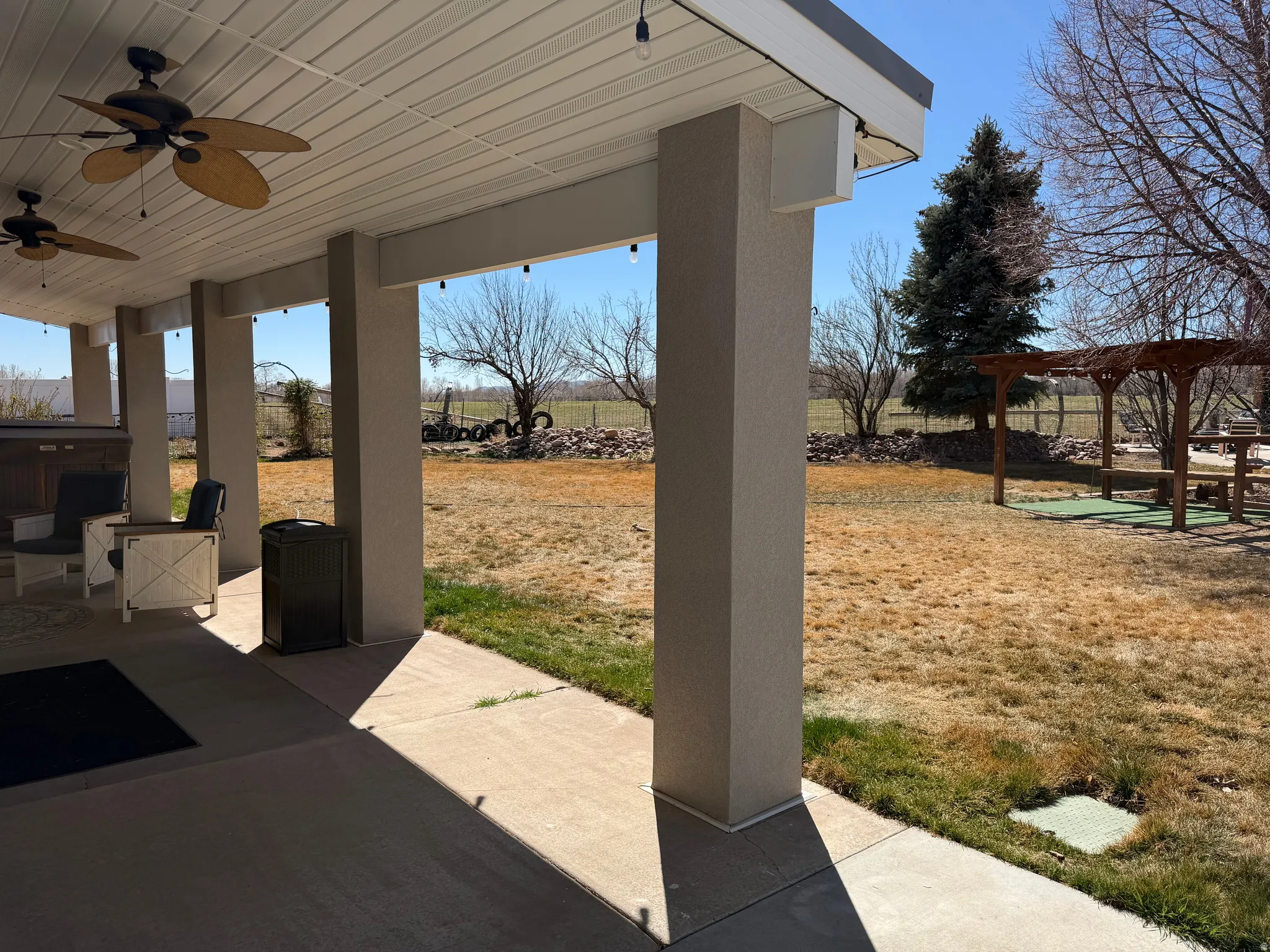 View of patio with ceiling fan