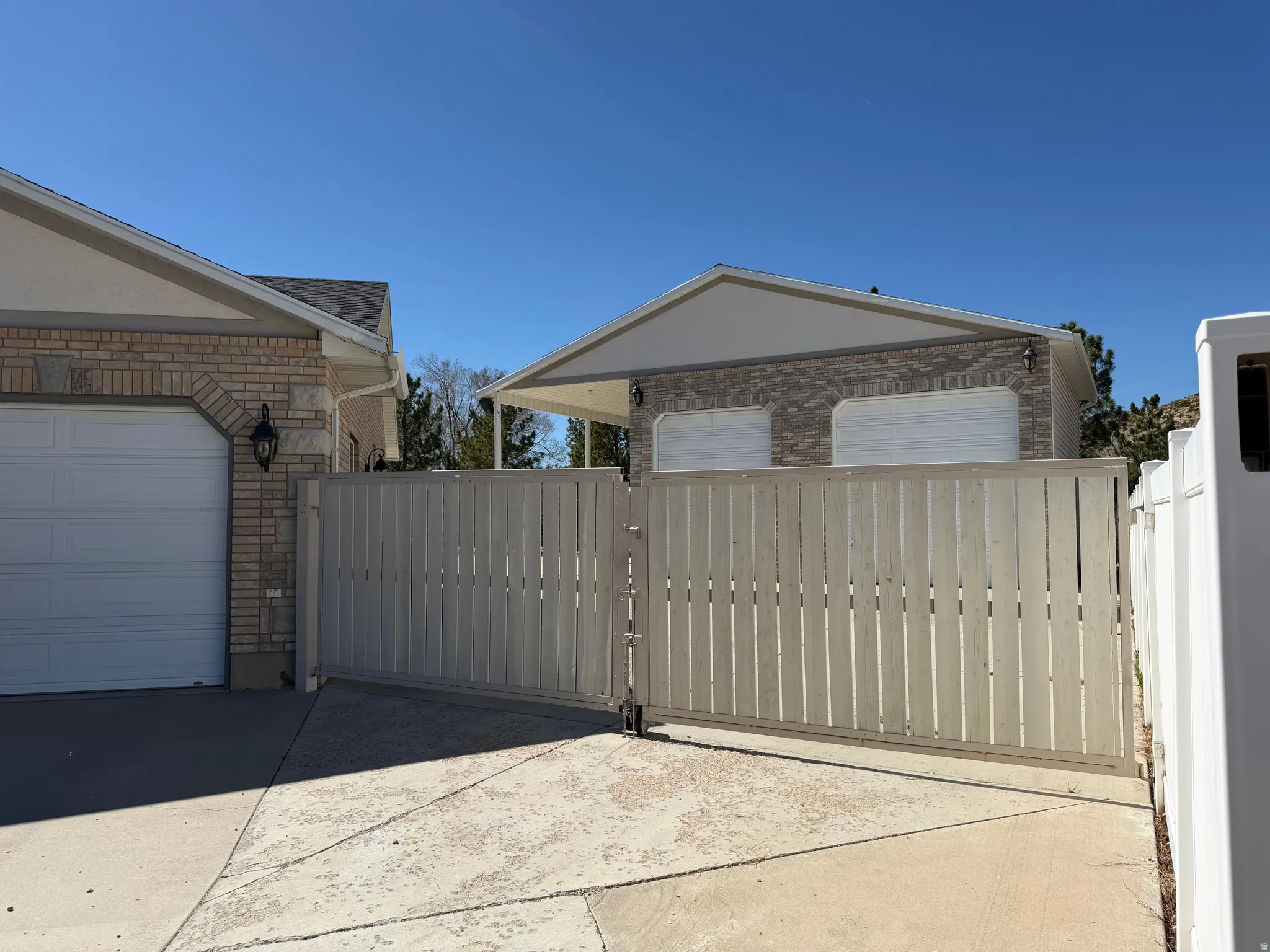 Gate with an outdoor structure