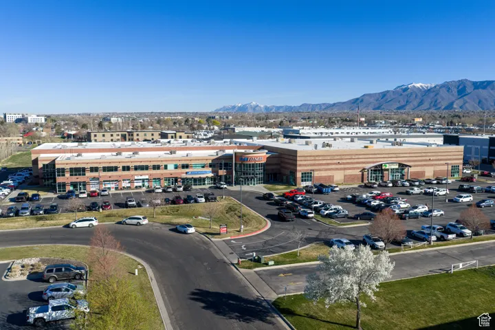 Bird's eye view of a commercial area and a mountain backdrop