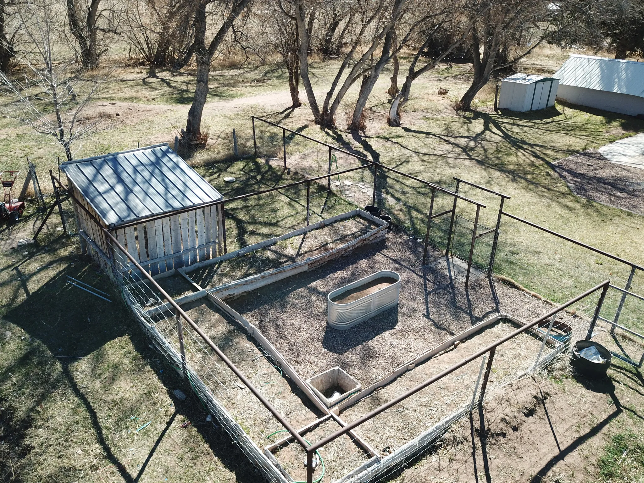 View of yard featuring a storage unit
