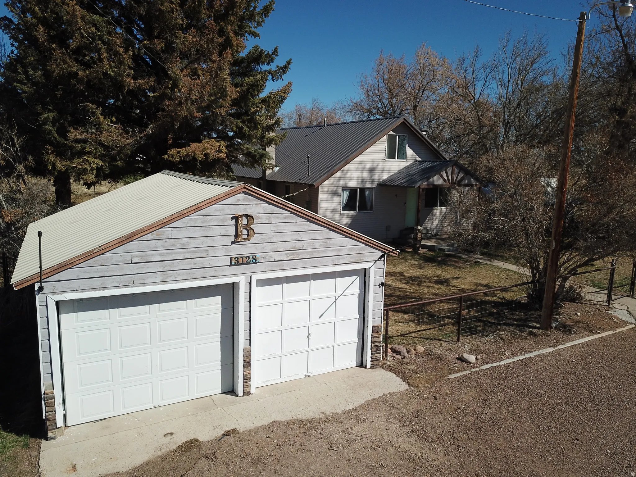 Garage featuring driveway