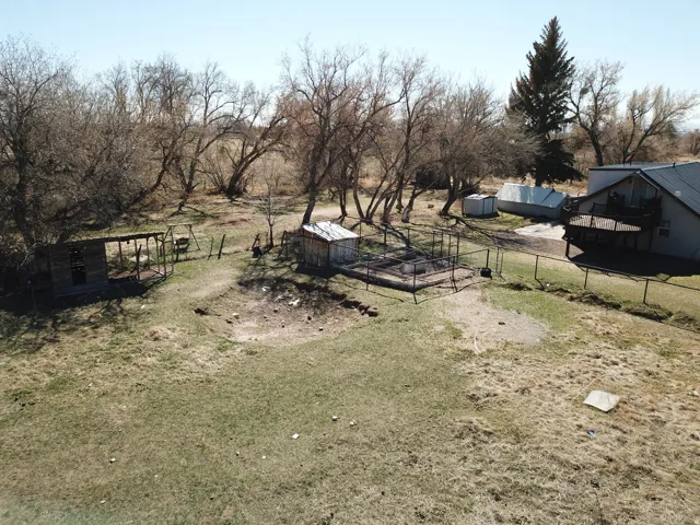 View of yard featuring an outbuilding and a rural view