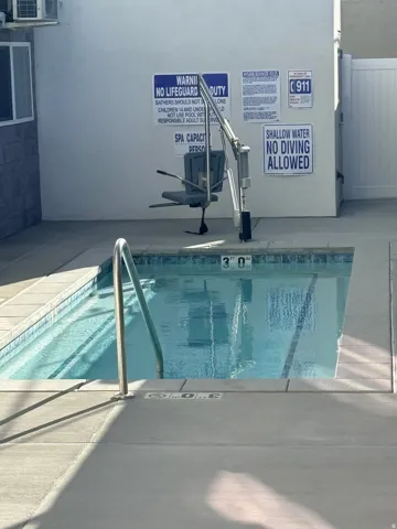 View of swimming pool with a pool