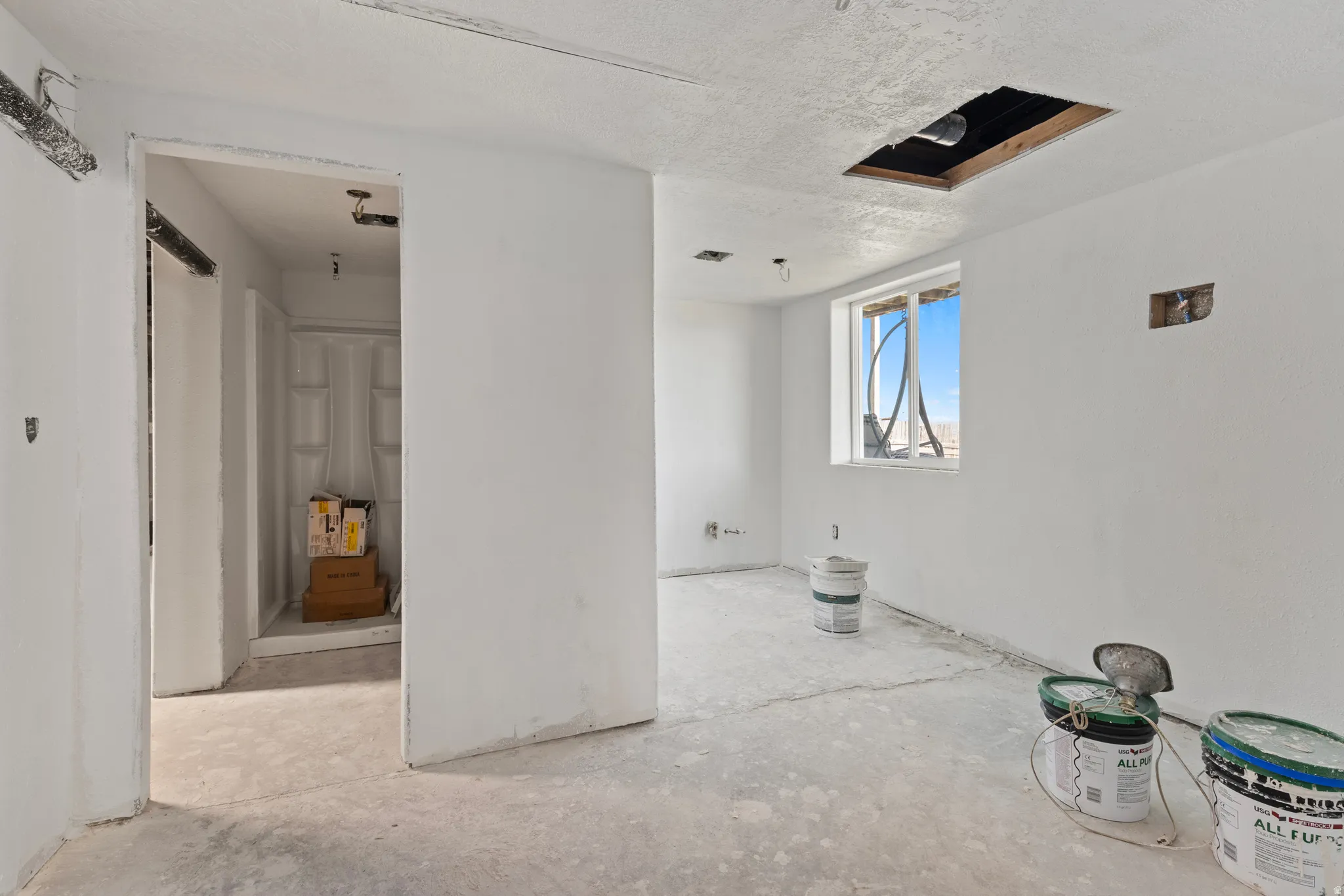 Spare room featuring a textured ceiling