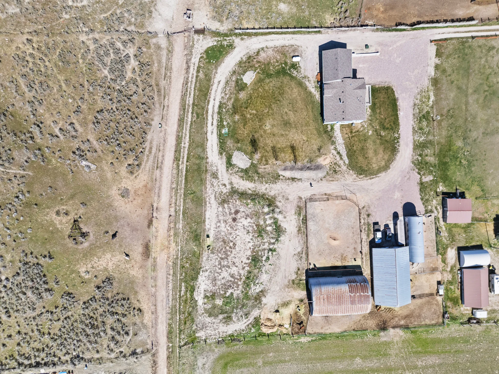 Aerial view of property and surrounding area with rural landscape