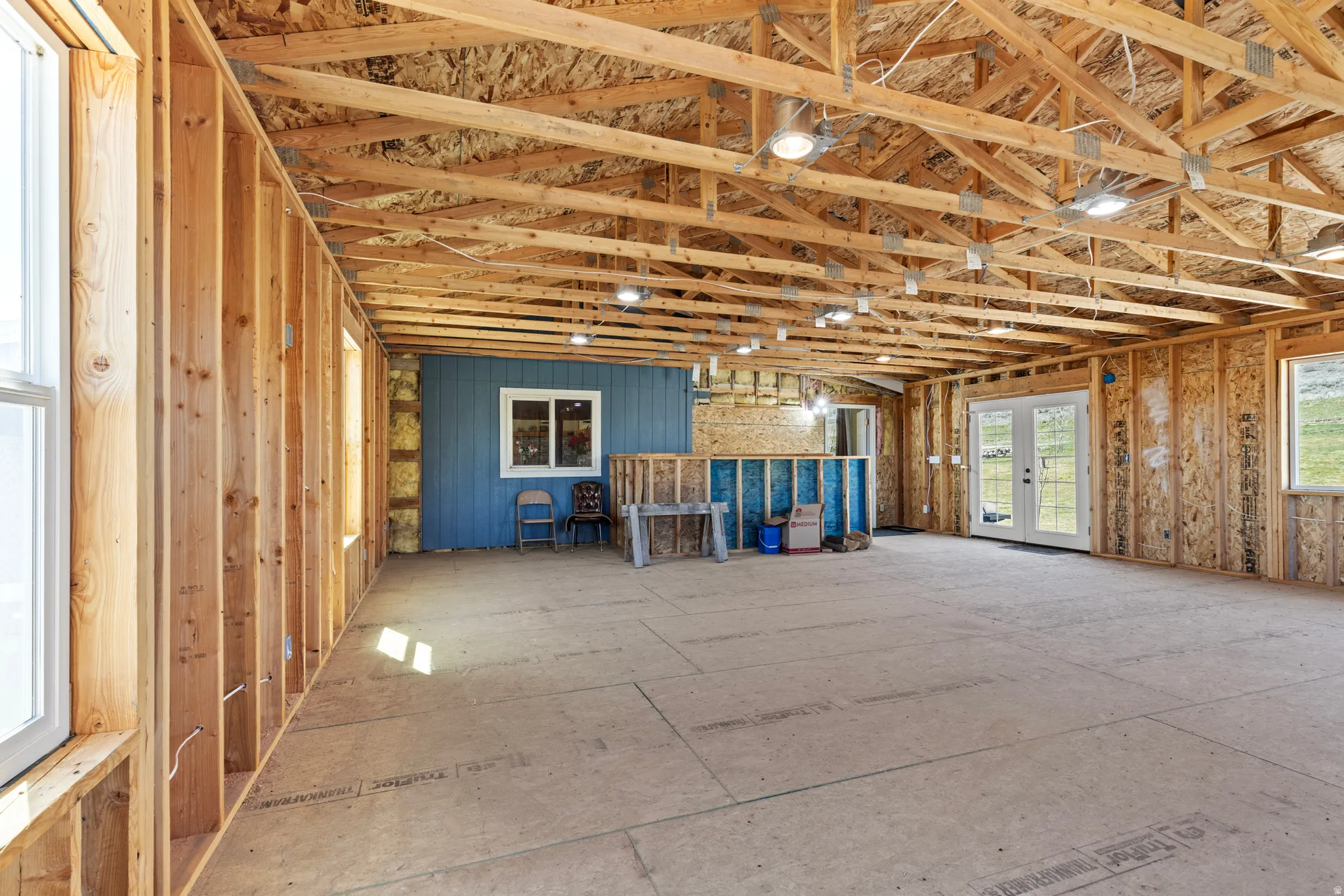 Miscellaneous room featuring french doors