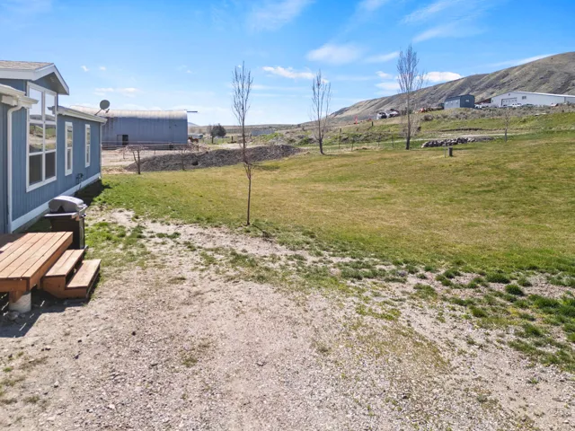 View of yard with a mountain view