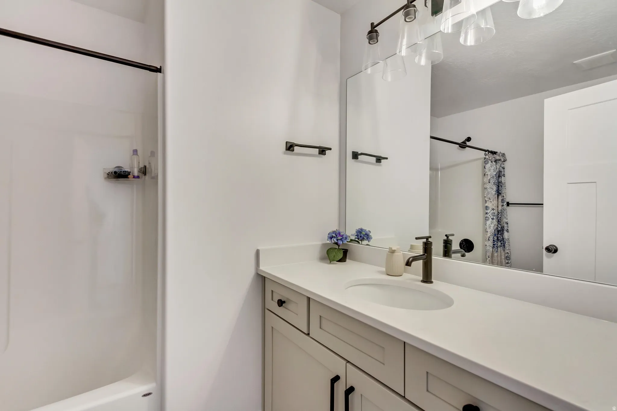 Full bathroom with vanity