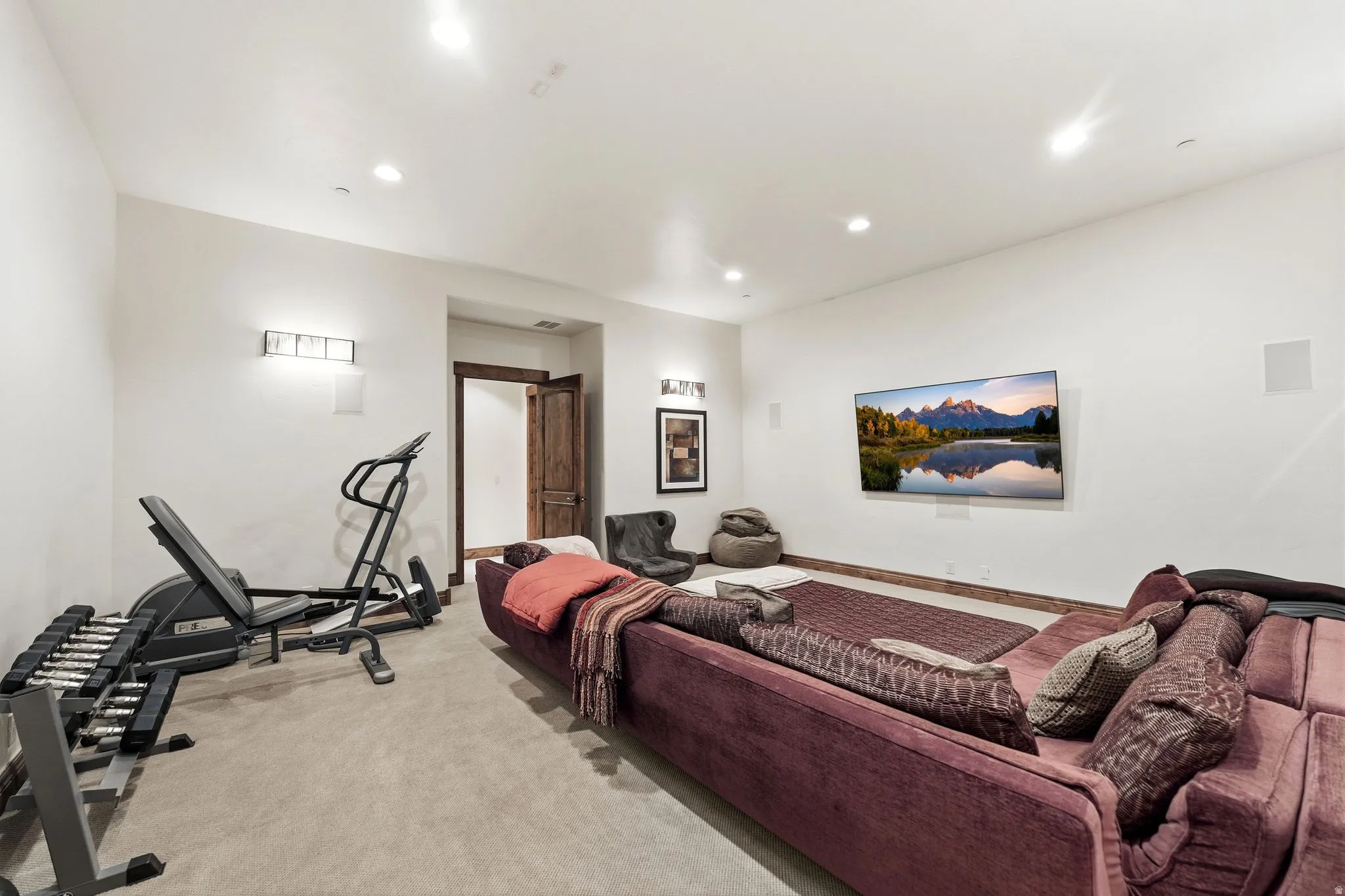 Bedroom featuring light colored carpet and recessed lighting