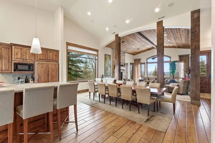 Dining space featuring light wood-type flooring, a vaulted wooden ceiling, and recessed lighting