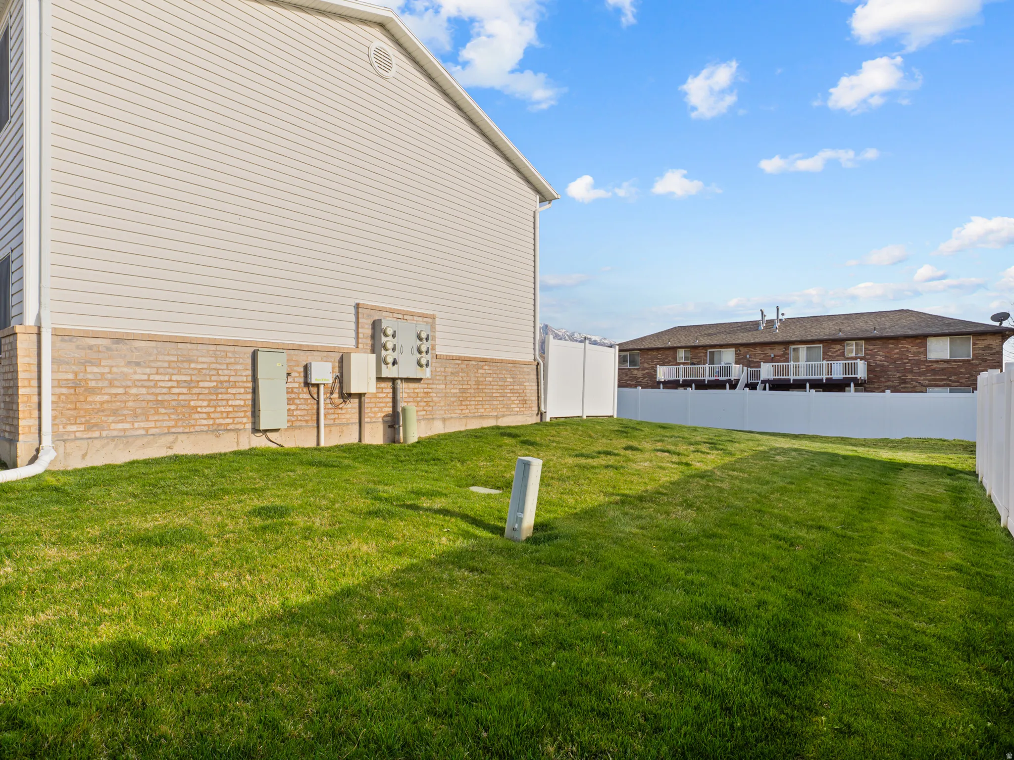 View of fenced backyard