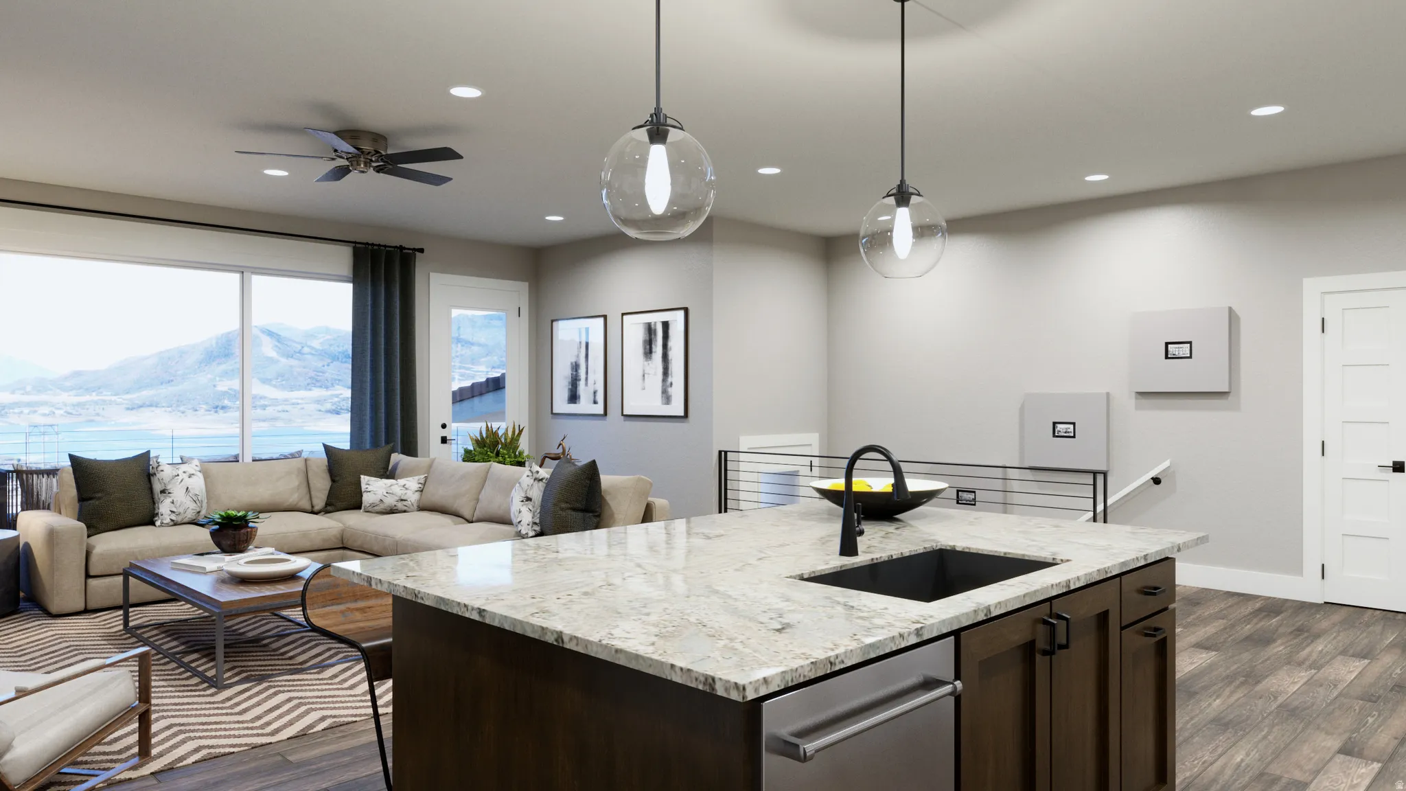 Kitchen featuring dark wood finish cabinets, a mountain view, light stone countertops, open floor plan, and dark wood-style flooring
