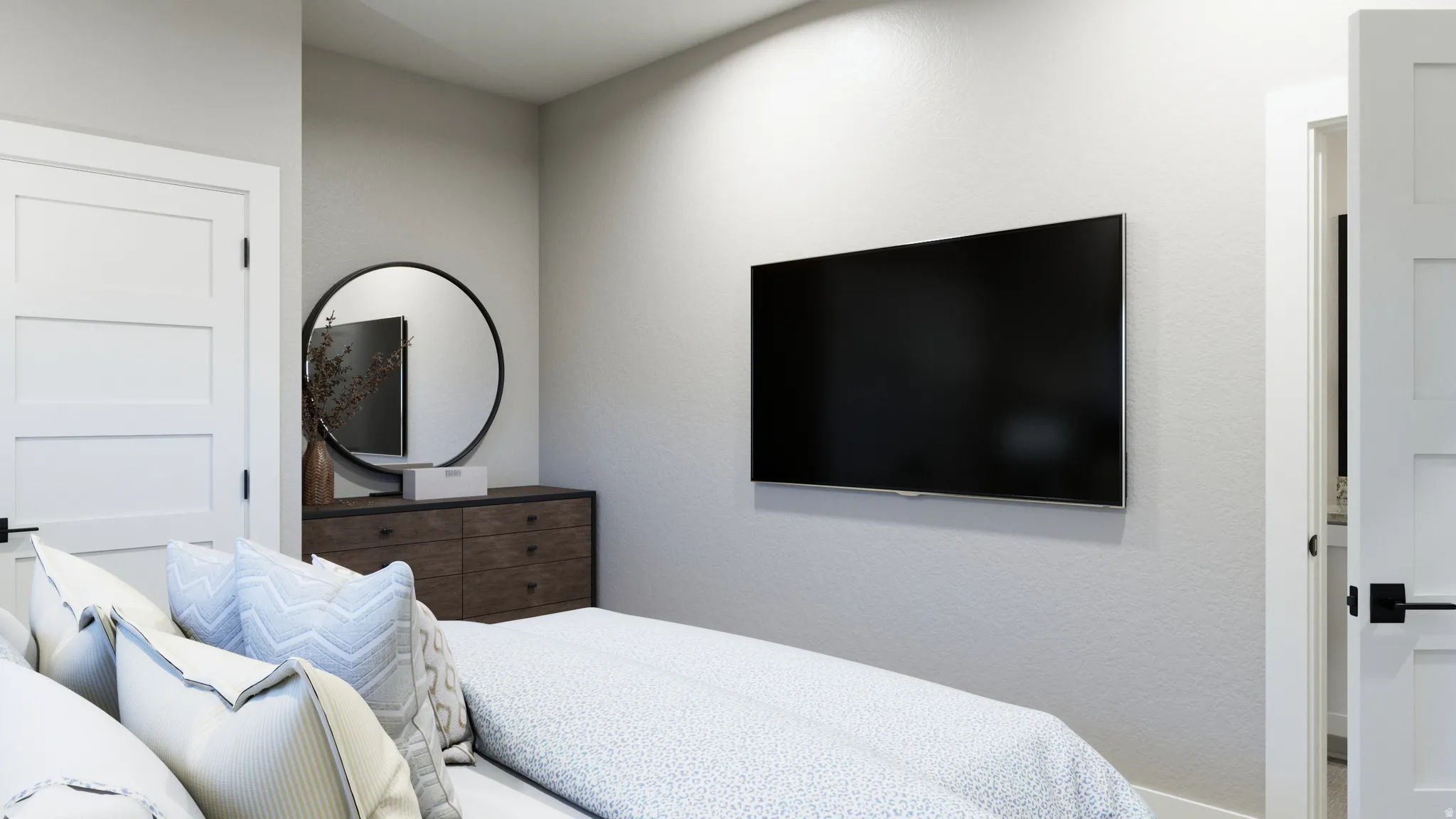 Bedroom featuring a textured wall