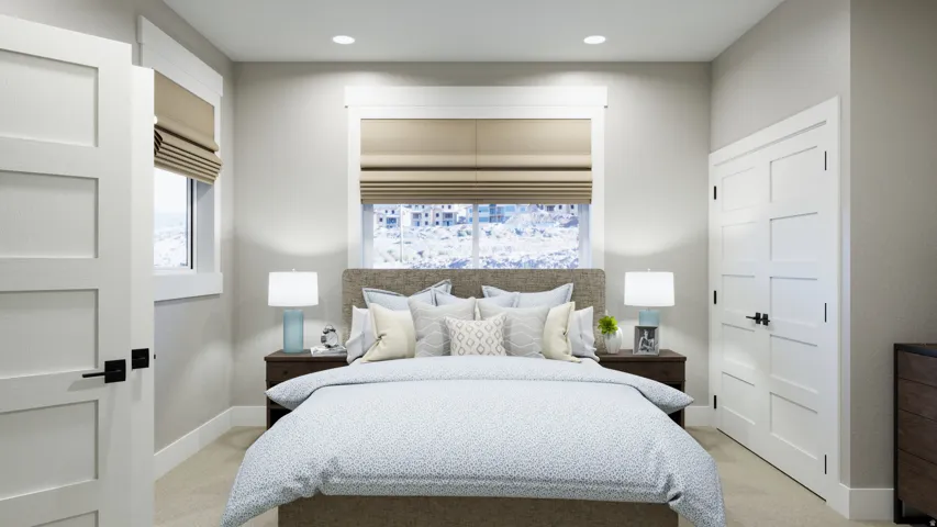 Bedroom with light carpet and recessed lighting