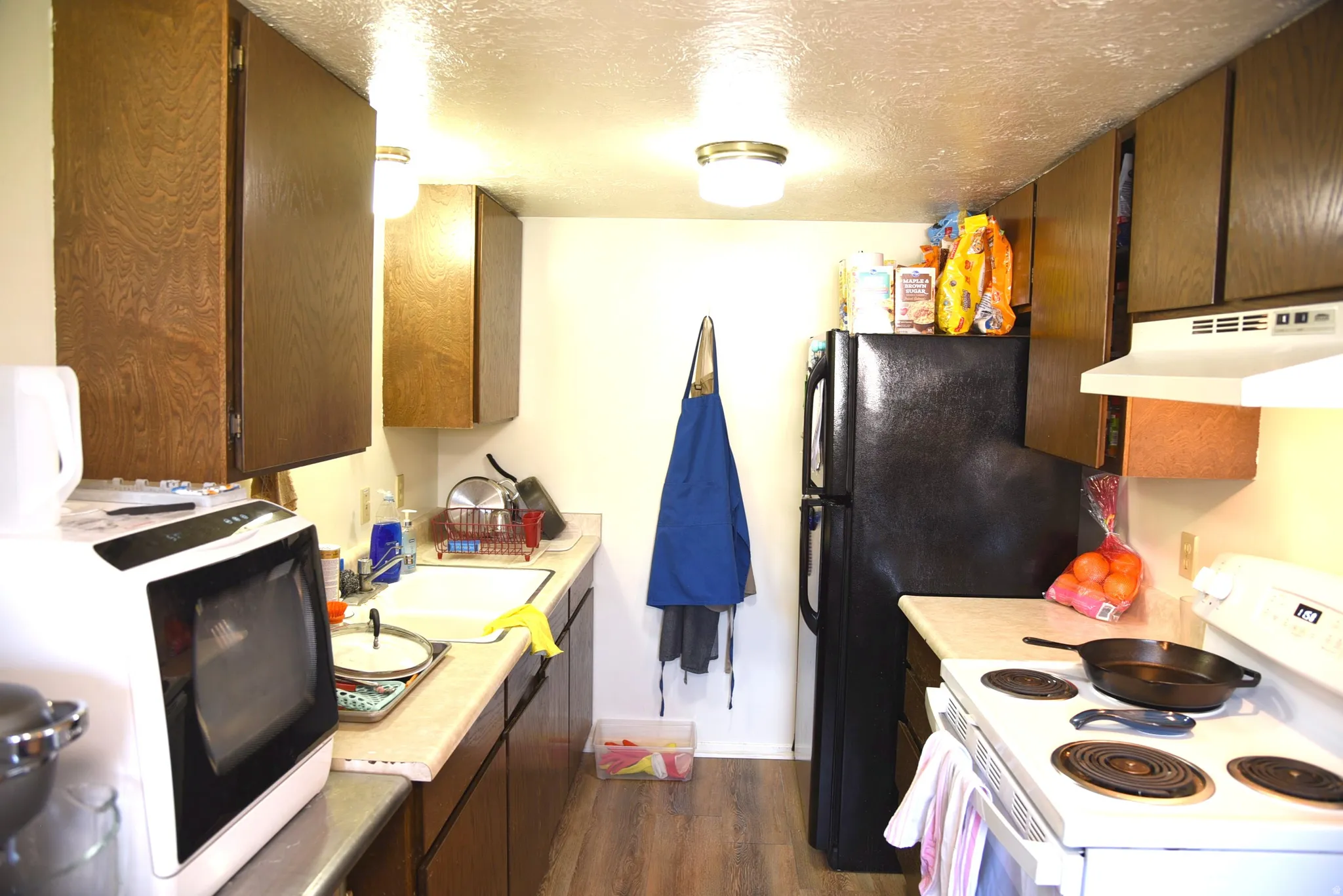 Kitchen (occupied), with updated flooring
