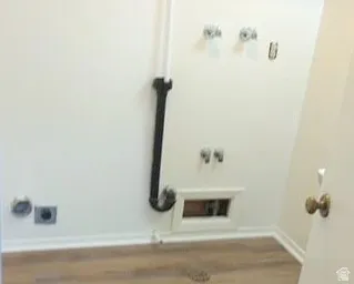 Laundry room with half bath
