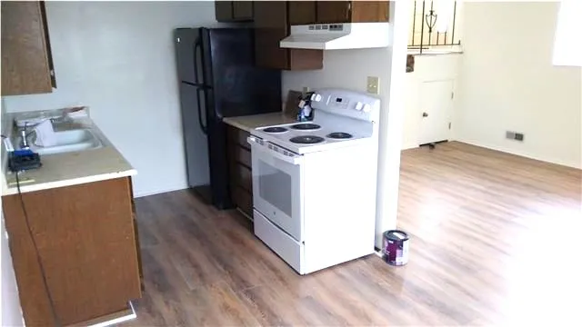 Kitchen (unoccupied with updated flooring)