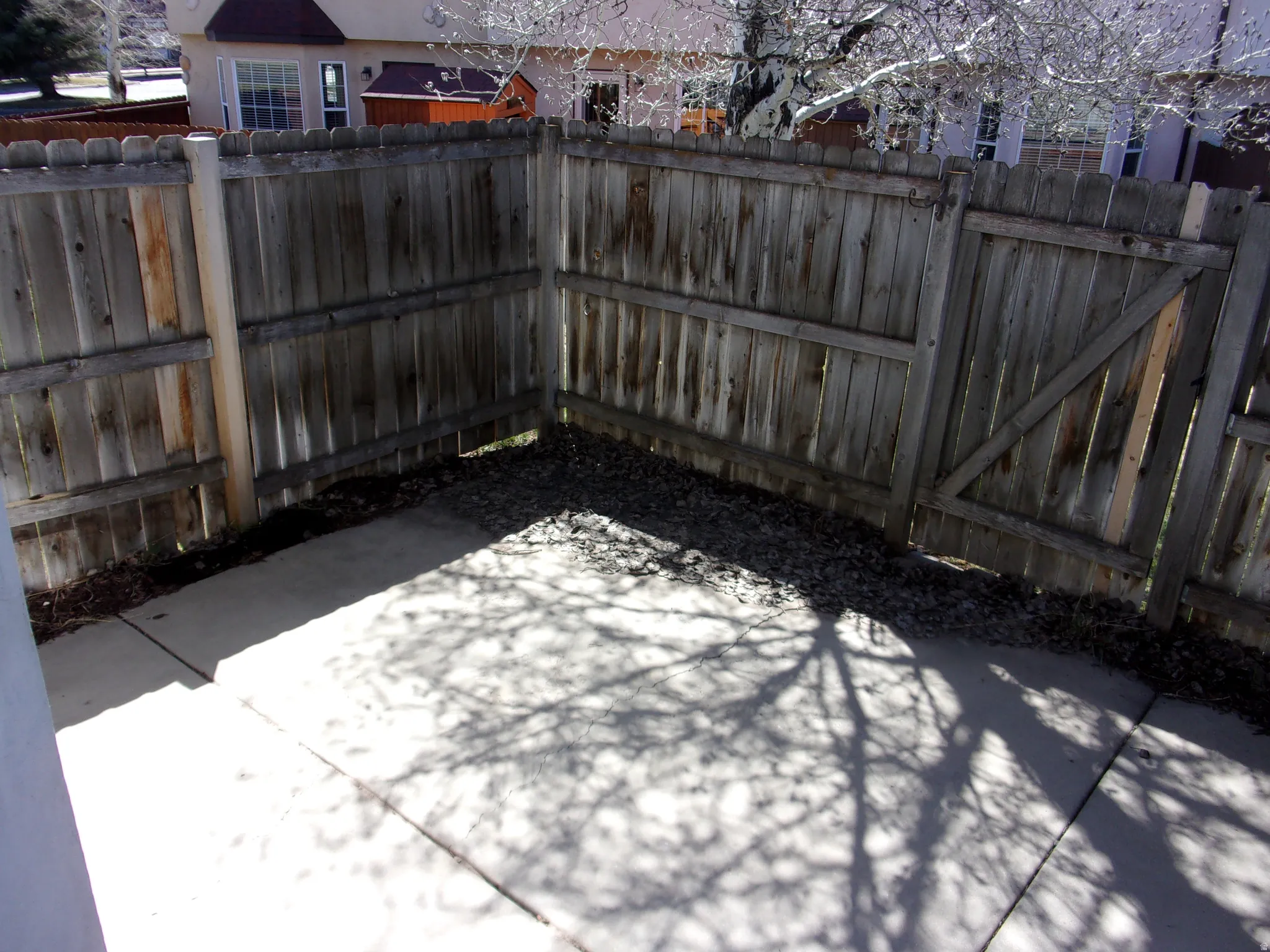 View of fenced backyard