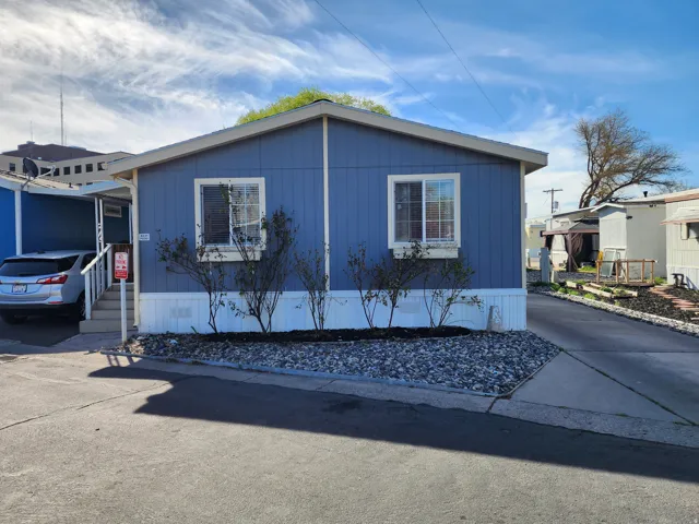 View of front of home featuring concrete driveway