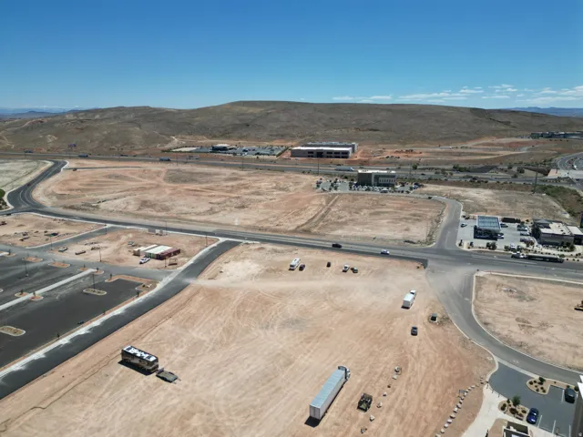 Aerial view of property and surrounding area with mountains and rural landscape