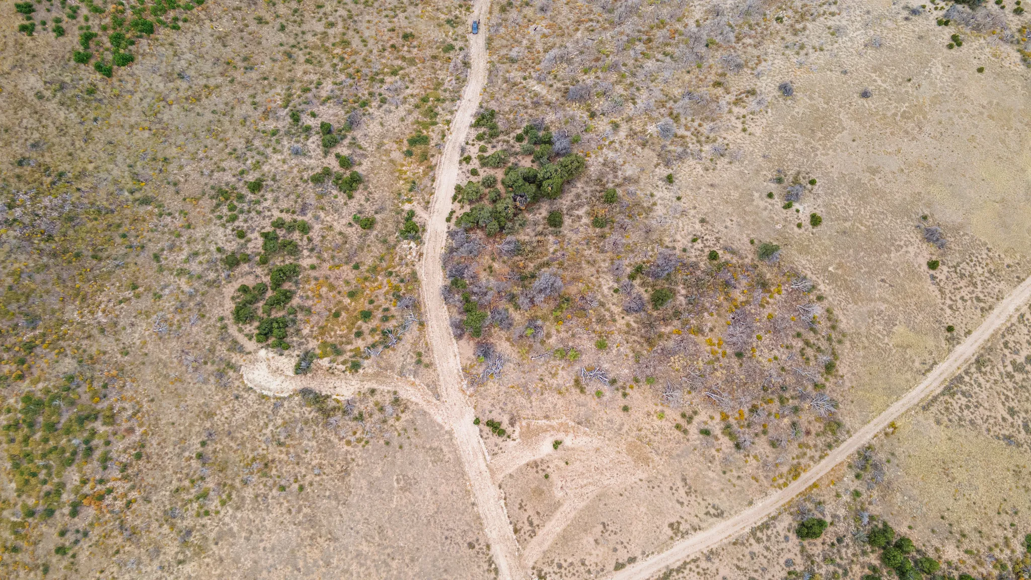Aerial view of sparsely populated area featuring a desert landscape