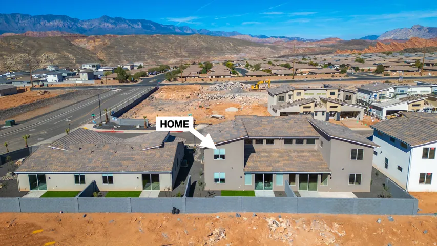 Aerial view of residential area with mountains