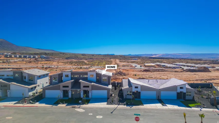 Aerial view of residential area with mountains
