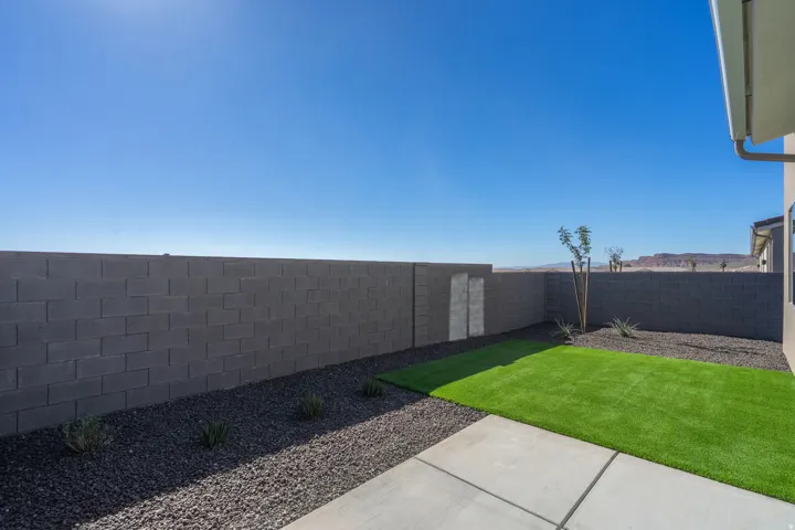 Fenced backyard featuring a patio area