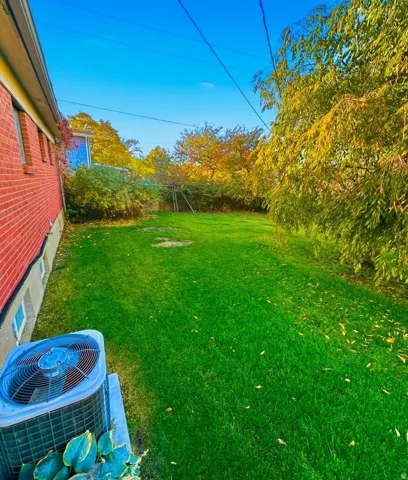 View of fenced yard (picture from summer)