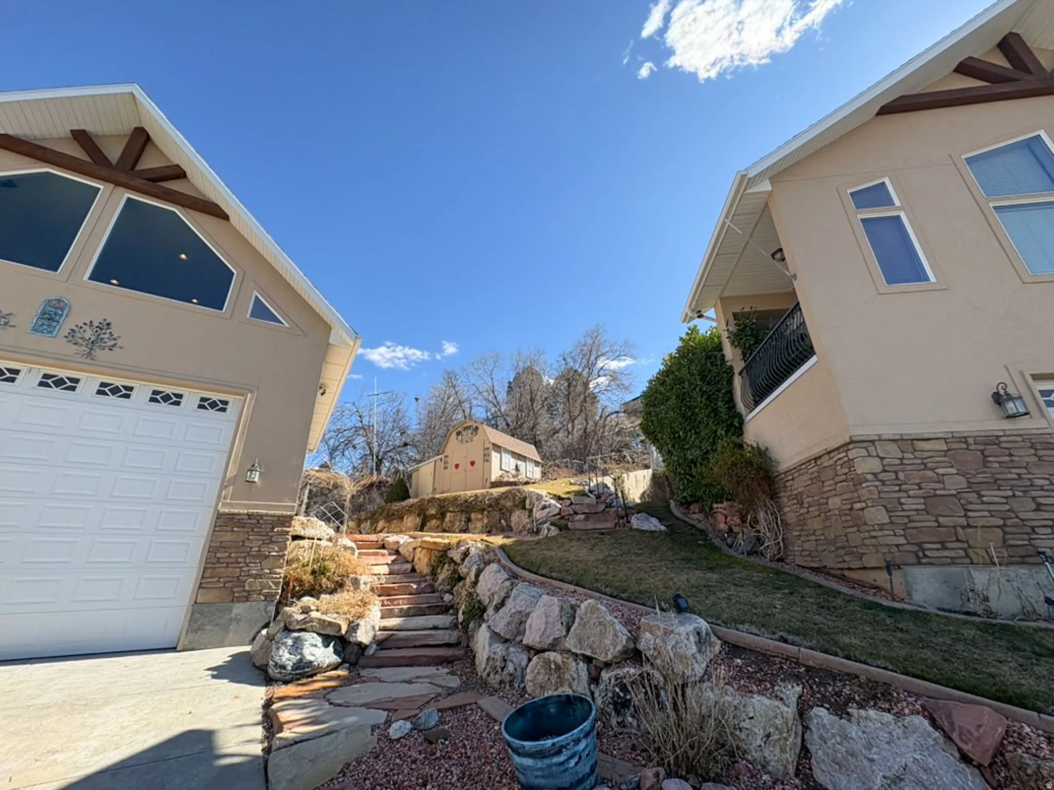 View of yard with a garage