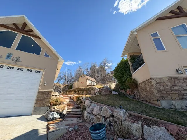 View of yard with a garage