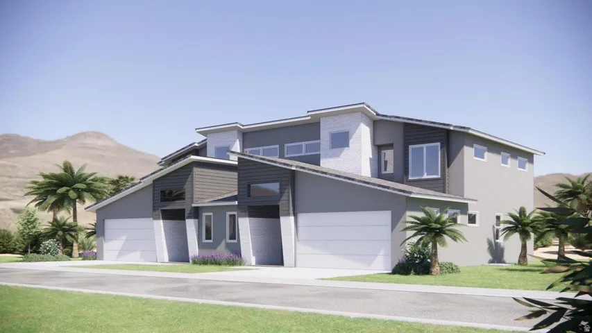 Contemporary home with stucco siding, a front yard, and an attached garage