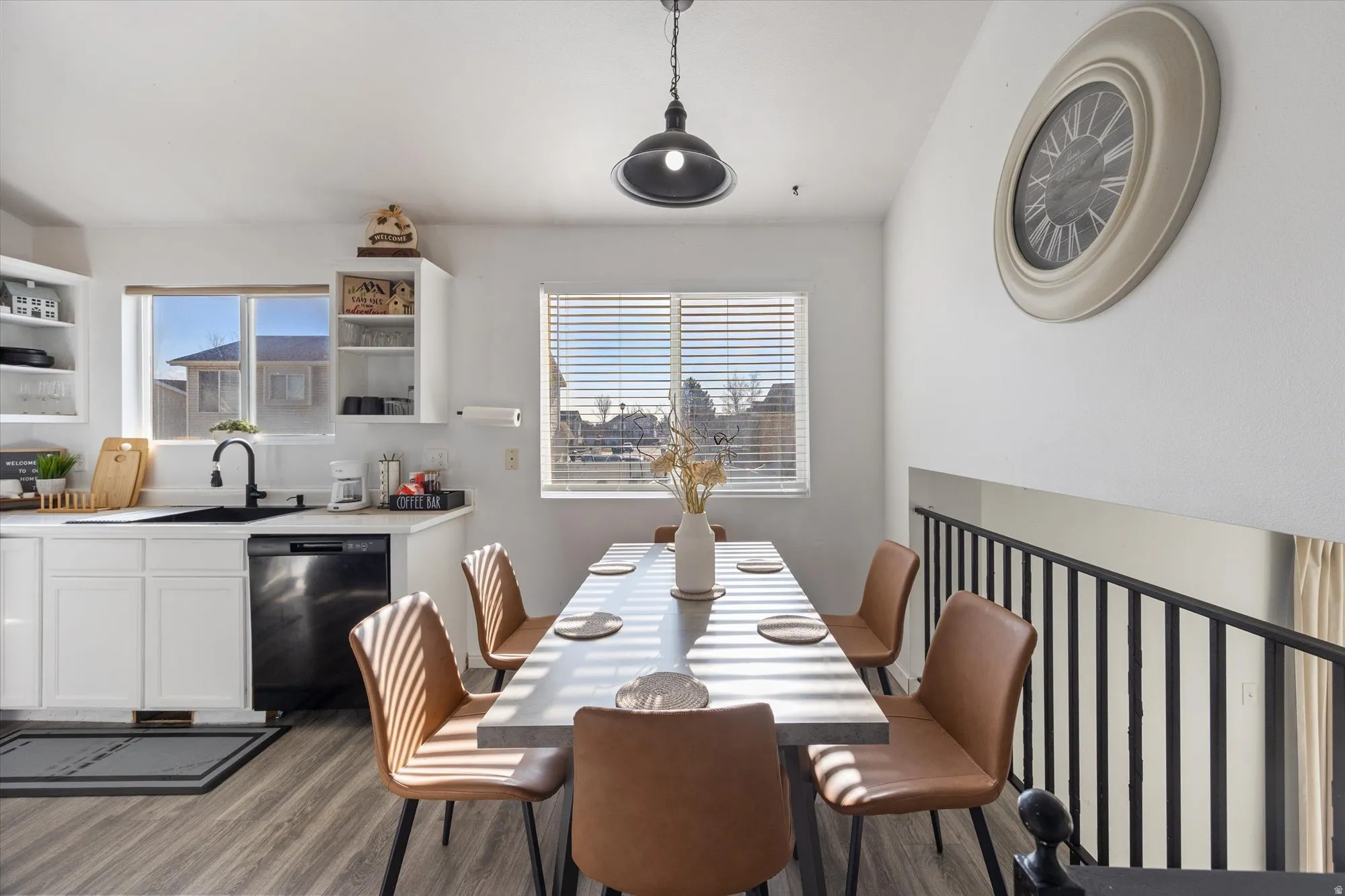 Dining room with dark wood-type flooring