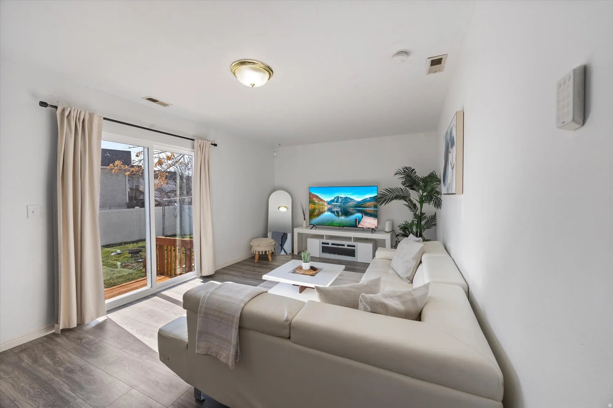 Living area with wood finished floors