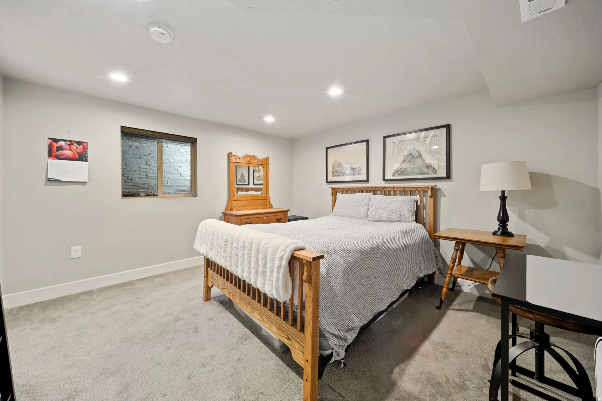 Bedroom featuring light colored carpet and recessed lighting