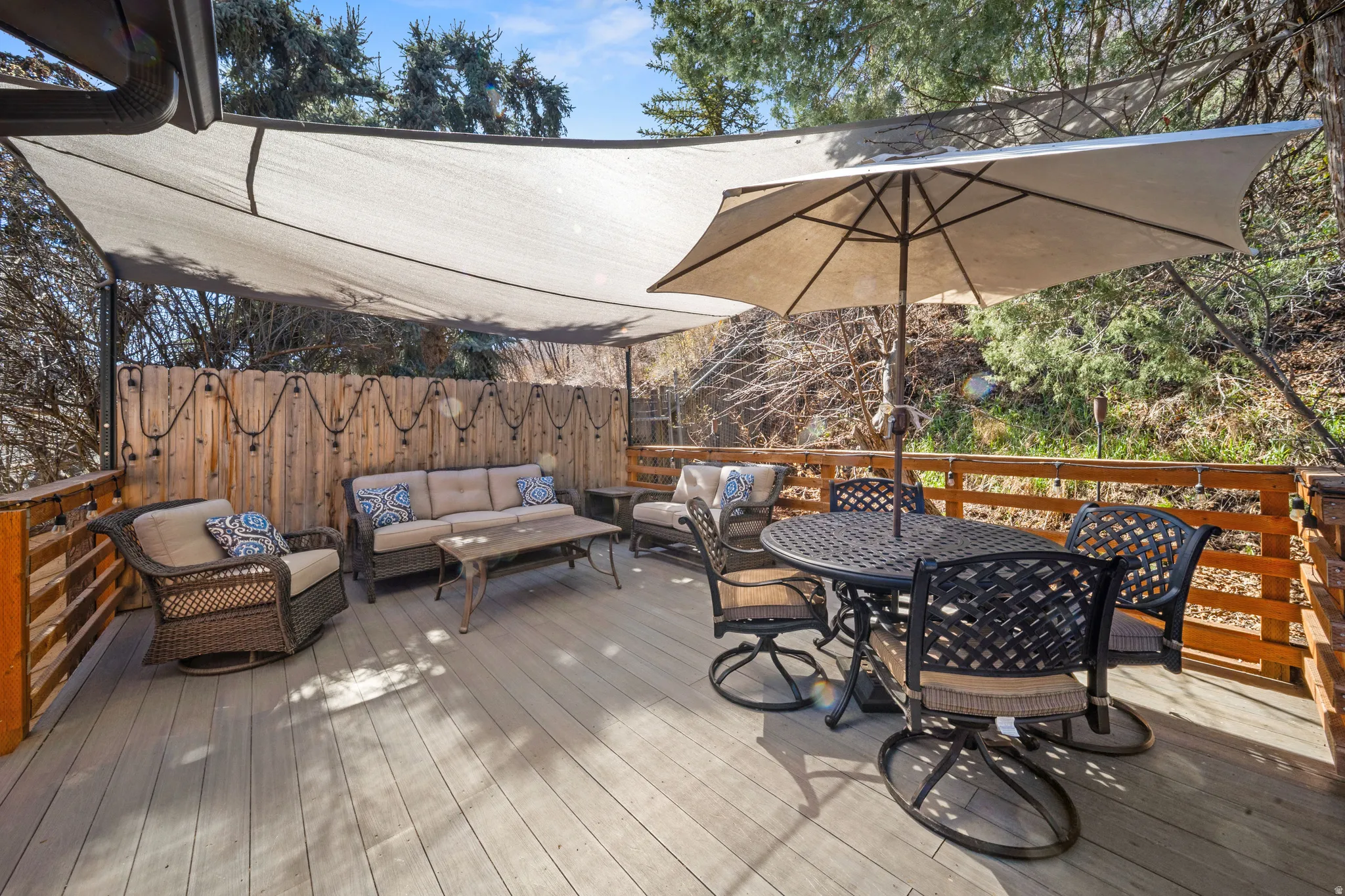 Wooden terrace with outdoor lounge area