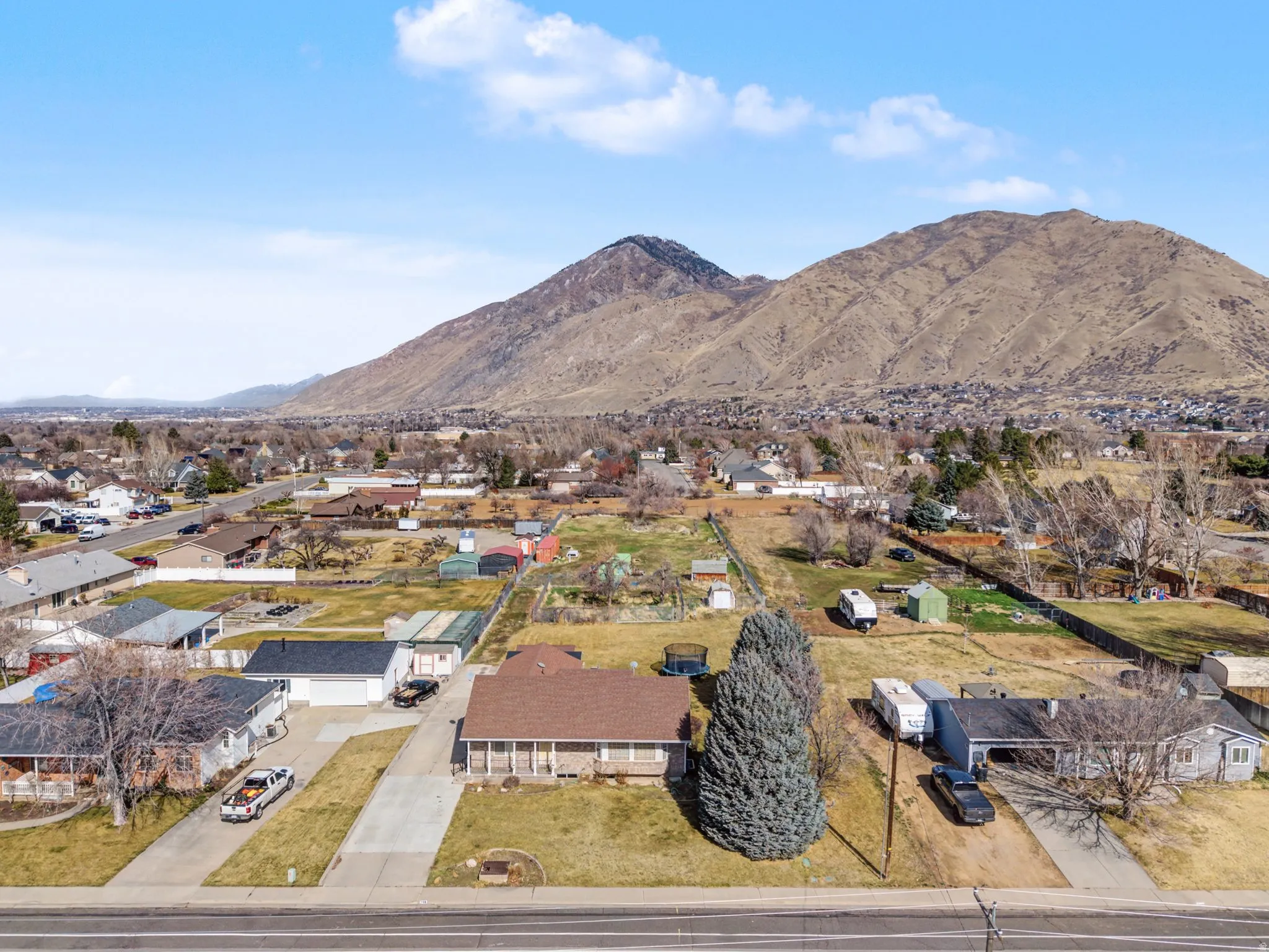 Aerial view of residential area with a mountainous background