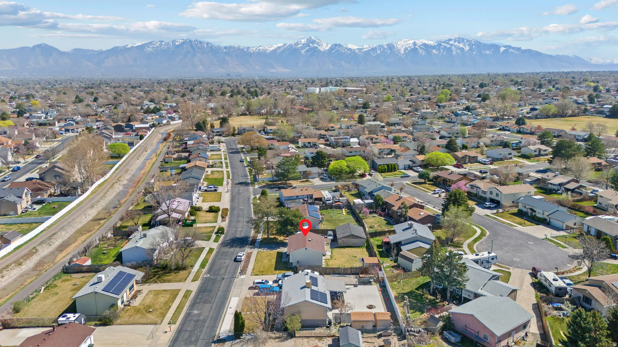 Aerial view of residential area with a mountain backdrop