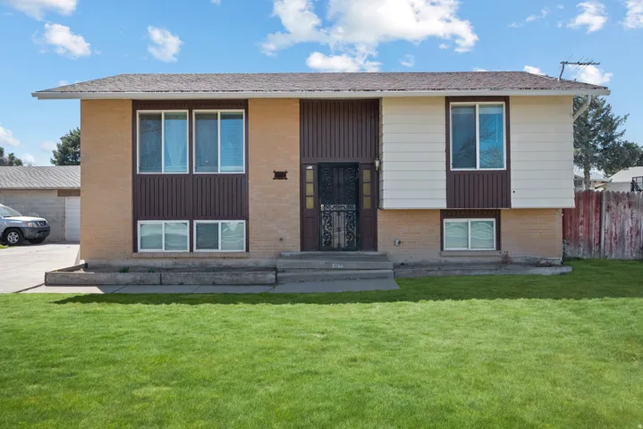 Bi-level home with brick siding