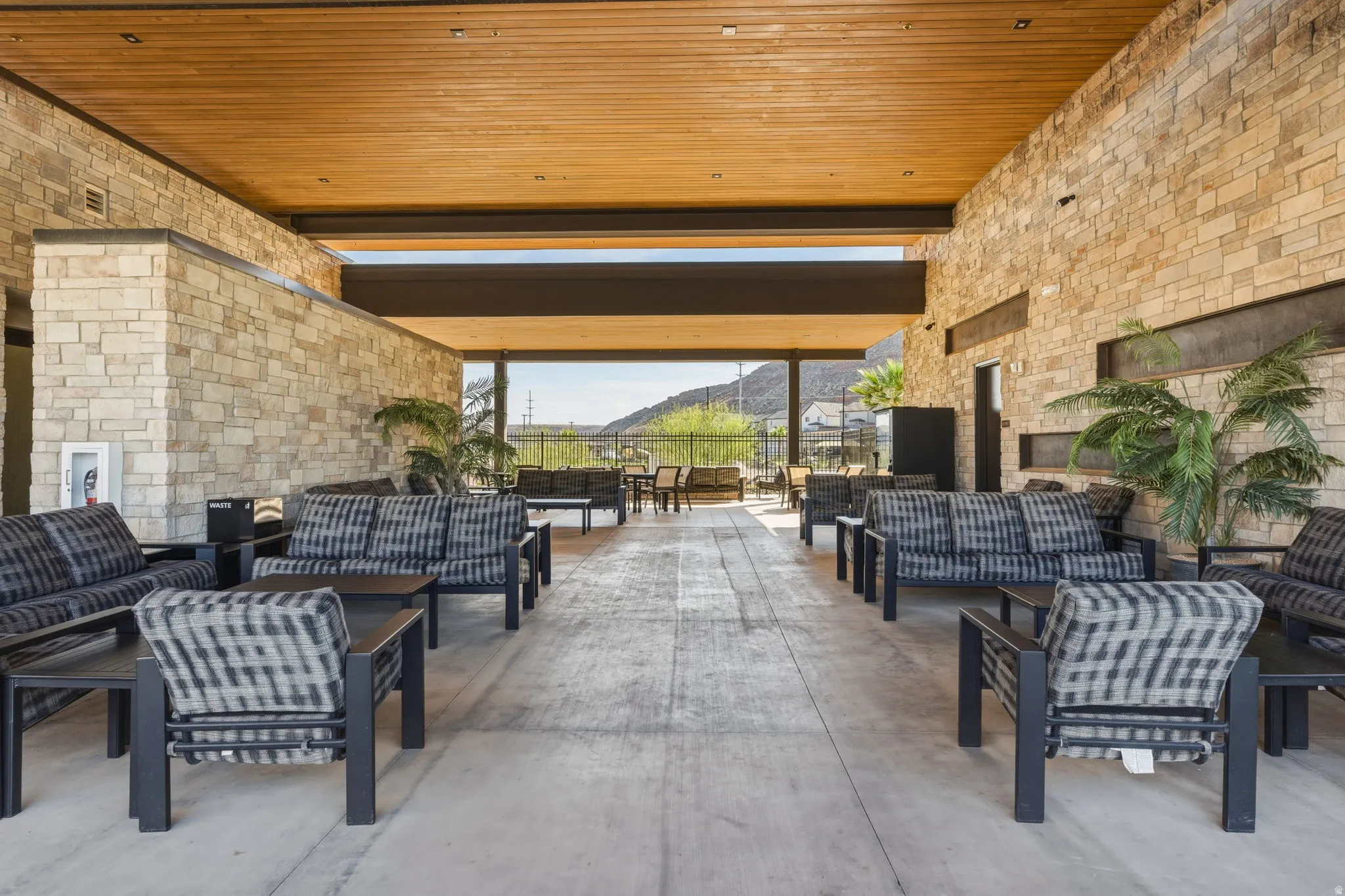 View of patio / terrace with an outdoor living space and a mountain view
