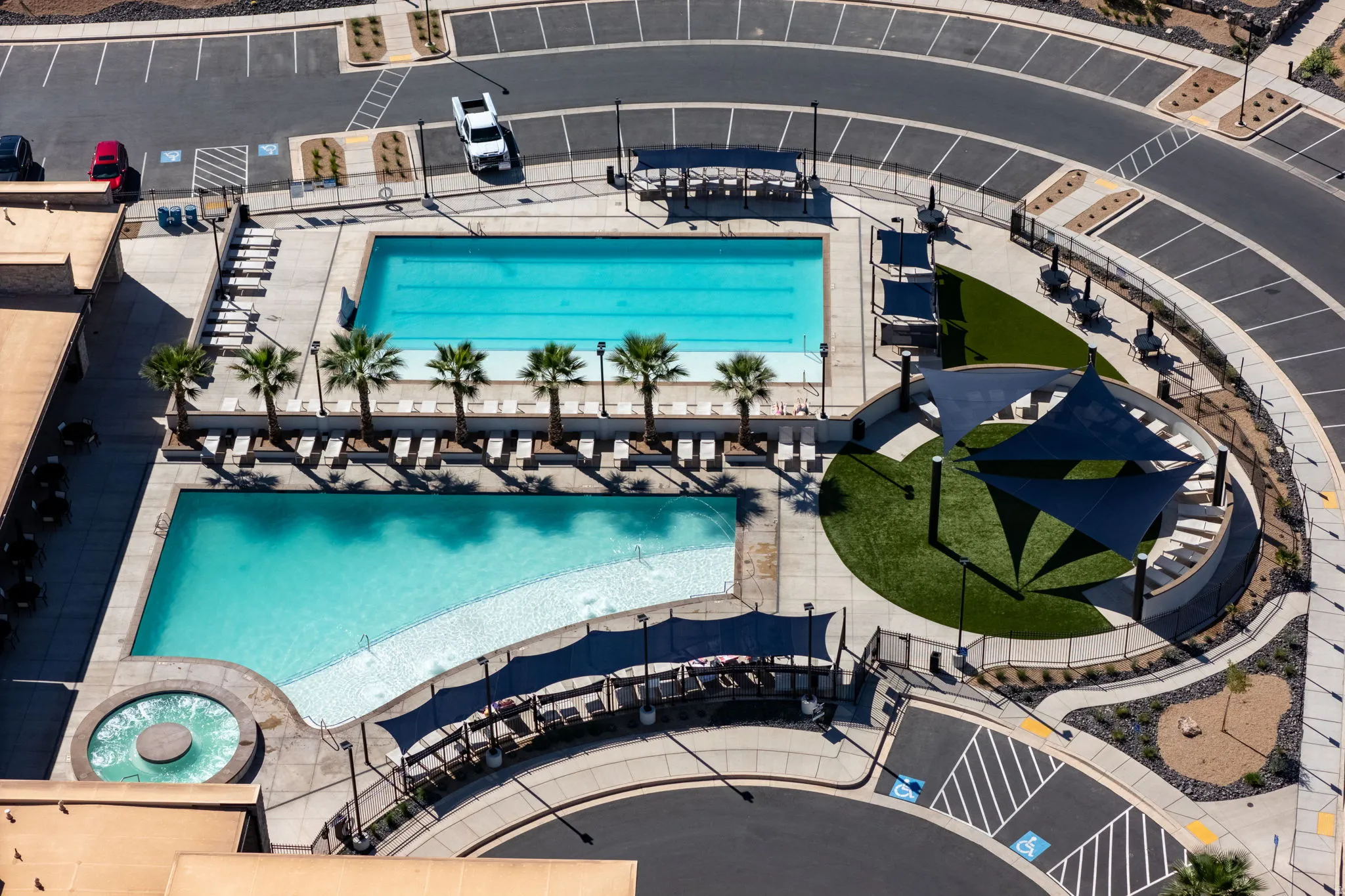 Community pool featuring a patio area